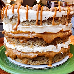 <strong>Banoffee Cake</strong> <br>banana cake . sticky toffee dulce . crunchy cinnamon shortbread . brown butter cream cheese frosting