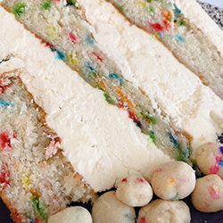 <strong>Funfetti Cake</strong> <br>rainbow sprinkle butter cake with funfetti buttercream icing